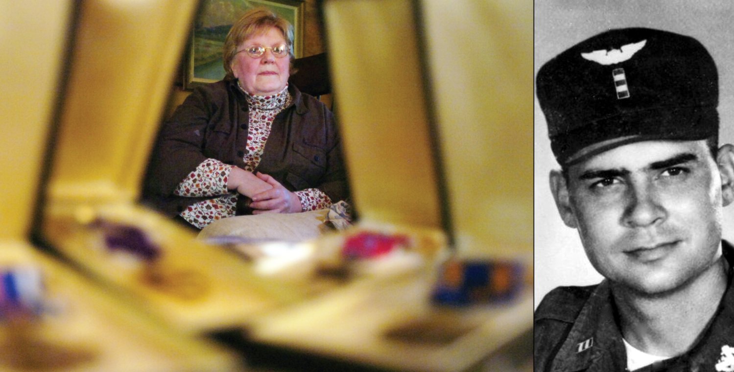 At left, Mary Dowling, pictured in this 2006 Chronicle file photo, is the widow of the first Lewis County casualty of the Vietnam War, Robert Dowling. Robert received many medals for his service including from left in the foreground, the Distinguished Flying Cross, the Purple Heart, the Bronze Star Medal and the Air Medal. At right is a photo of Robert Dowling courtesy of the Vietnam Veterans Memorial Fund.